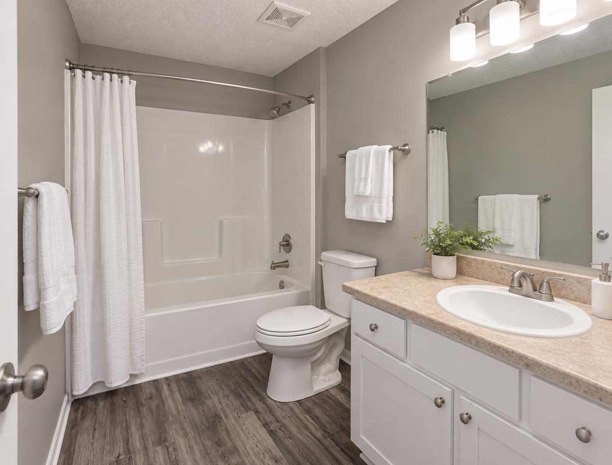 Bathroom with tub and vanity